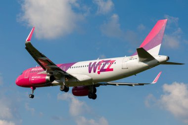 LVIV, UKRAINE - September 12, 2021: Wizz Air plane in flight. The plane is flying.