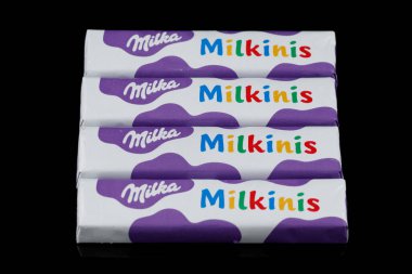LVIV, UKRAINE - August 27, 2021: Milka Milkinis chocolate in a wrapper