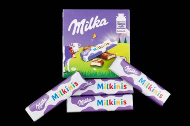 LVIV, UKRAINE - August 27, 2021: Milka Milkinis chocolate in a wrapper