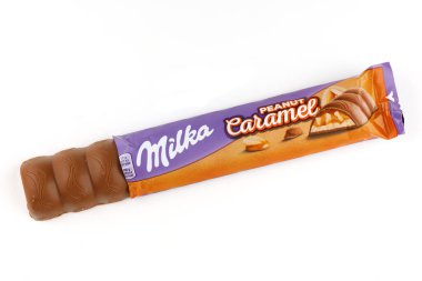 LVIV, UKRAINE - September 14, 2021: Milka Caramel peanut chocolate bar