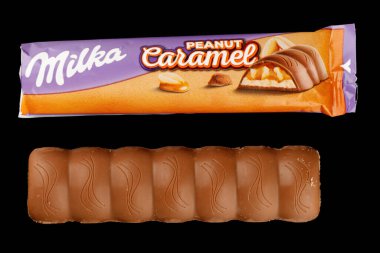 LVIV, UKRAINE - September 14, 2021: Milka Caramel peanut chocolate bar