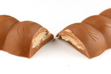 LVIV, UKRAINE - September 14, 2021: Milka Caramel peanut chocolate bar