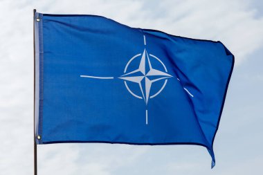 LVIV, UKRAINE - September 30, 2021: NATO flag on a flagpole