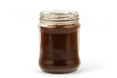 Coffee in a glass jar isolate close-up