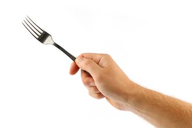 Fork in hand isolate close-up