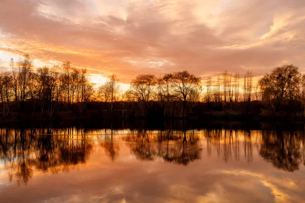 Beautiful landscape on the lake. Sunset.