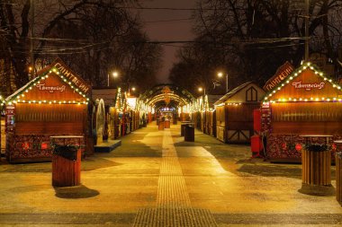 LVIV, UKRAINE - December 21, 2021: Christmas market. Festive New Year's fair 2021-2022