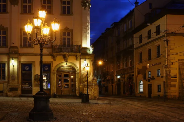 LVIV, UKRAINE - December 21, 2021: Market Square at night