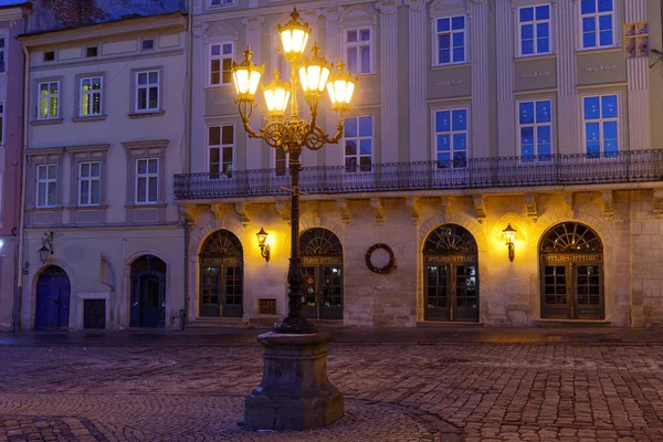 LVIV, UKRAINE - December 21, 2021: Market Square at night