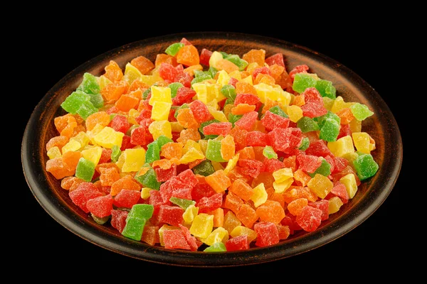 Multicolored candied fruits in a plate