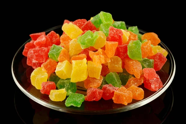 Multicolored candied fruits in a plate