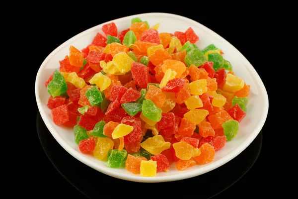 Multicolored candied fruits in a plate