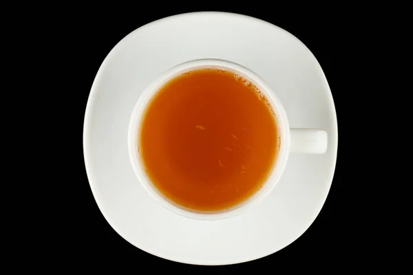 红底茶杯中的绿茶 — 图库照片