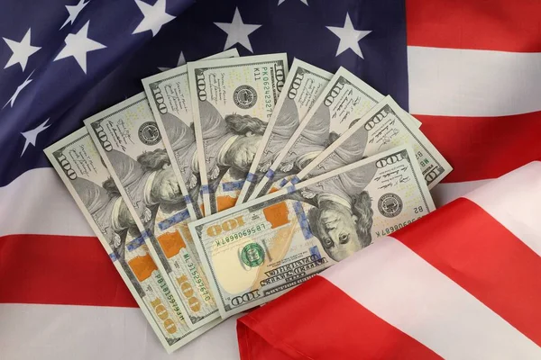 USA flag and money dollars