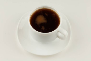 Coffee in a white cup isolate