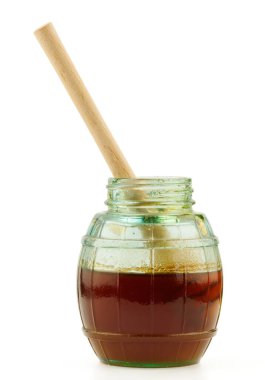 Bal ve tahta kaşık ile Cam Kavanoz