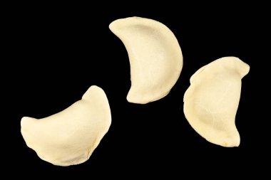 Frozen dumplings on a black background