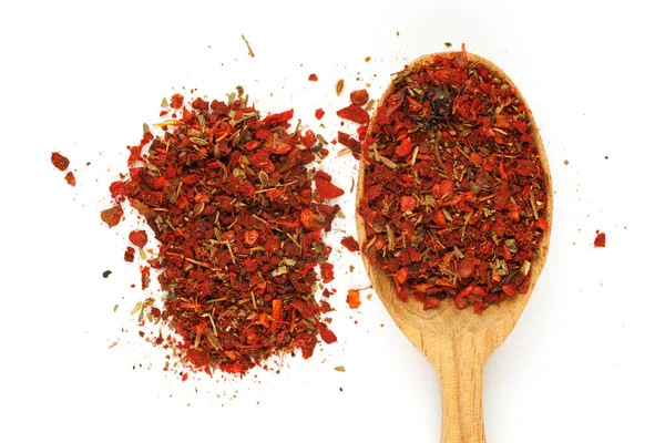 seasoning for pilaf in a wooden spoon