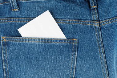 White waste paper sticker in pants pocket