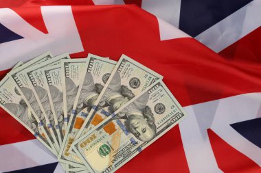 Flag of Great Britain and money dollars