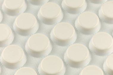 Pills in a white blister