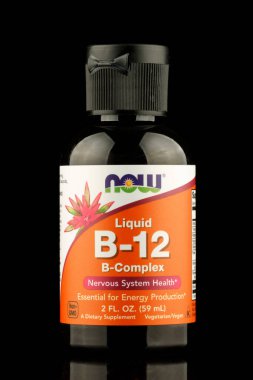 LVIV, UKRAINE - May 29, 2022: Vitamin B12 in a bottle. NOW company