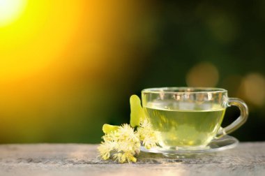 Linden tea in a transparent cup.