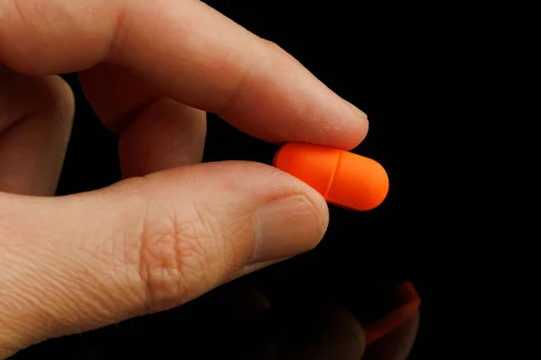 Orange Oblong Tablet Hand — Stok fotoğraf