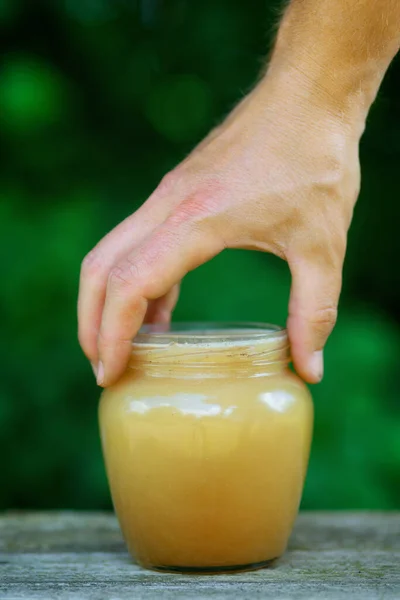 Honey Jar Hand — Zdjęcie stockowe