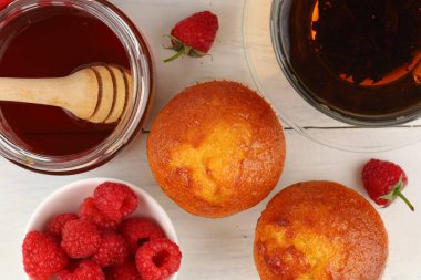Breakfast with muffins. Delicious pastries on the table