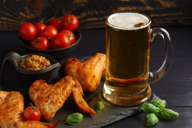 chicken wings and beer. Hearty and tasty food.