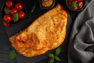 Chebureks with meat. Fried in oil chebureks with meat and herbs. Street food