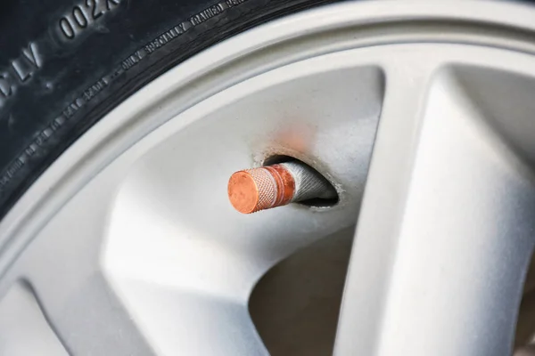 Tire Valve Stem Orange Cap Grey Car Alloy Wheel — Stock Photo, Image