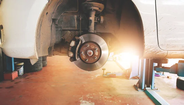 Disc Brakes Calipers Wheels Car Auto Repair Garage Sunlight —  Fotos de Stock
