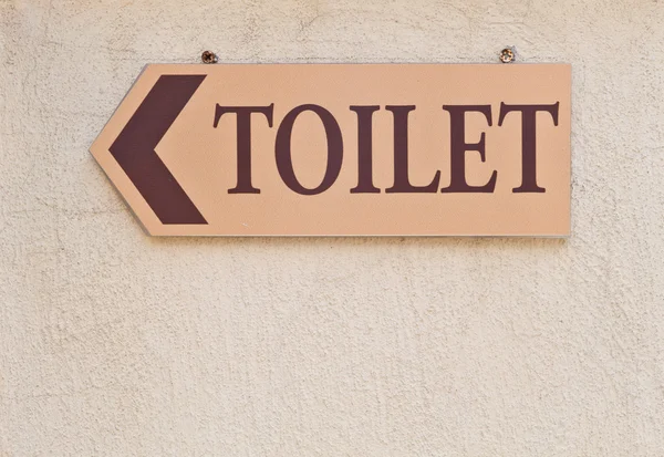 Znak toaletowy na ścianie — Zdjęcie stockowe