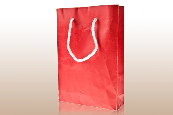 Red Crumpled paper bag isolated on white background — Stock Photo, Image