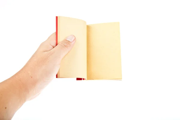 Красная книга открыта с рукой на белом фоне — стоковое фото
