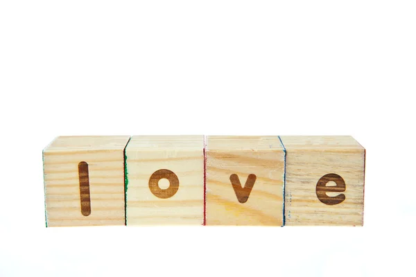 Love by block toy isolated on white background — Stock Photo, Image