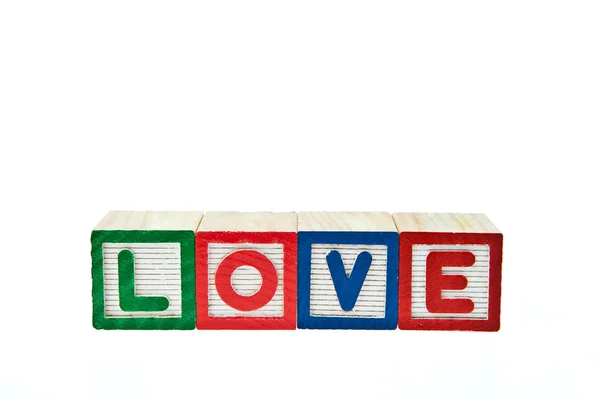 Love by block toy isolated on white background — Stock Photo, Image