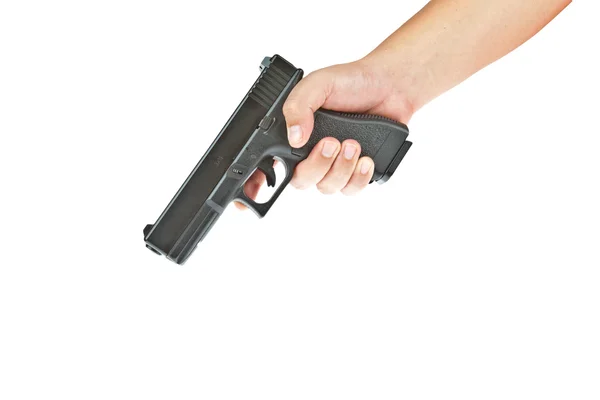 Airsoft hand pistol, glock modell med hand syftar på golvet — Stockfoto