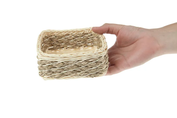 Wicker låda med hand isolerad på vit bakgrund — Stockfoto