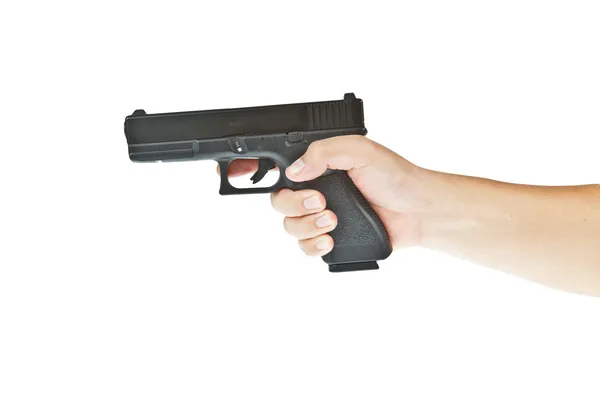 主营手枪，用一只手的 glock 模型瞄准目标 — 图库照片