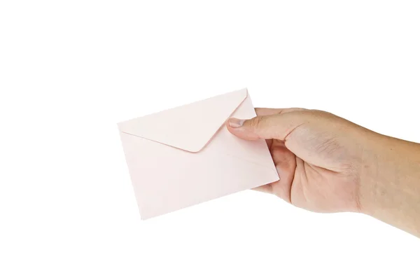 Enveloppe rose avec main isolée sur fond blanc — Photo