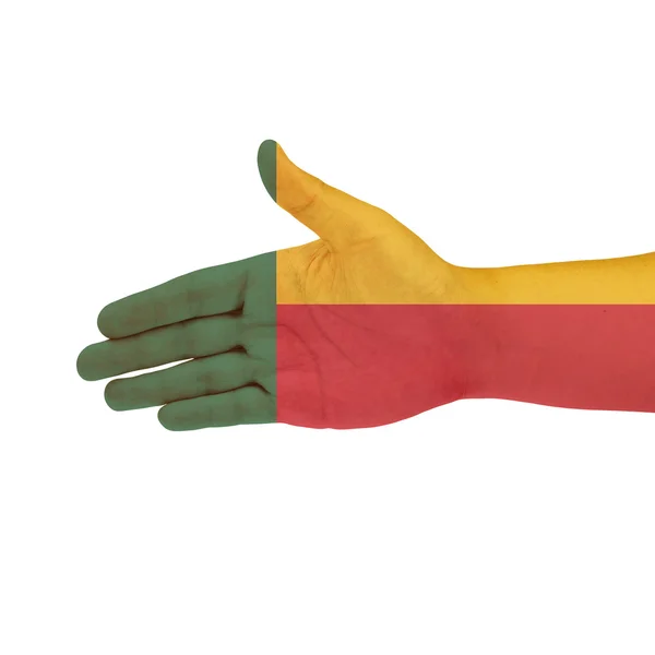 Bandeira do Benim na mão isolada sobre fundo branco — Fotografia de Stock