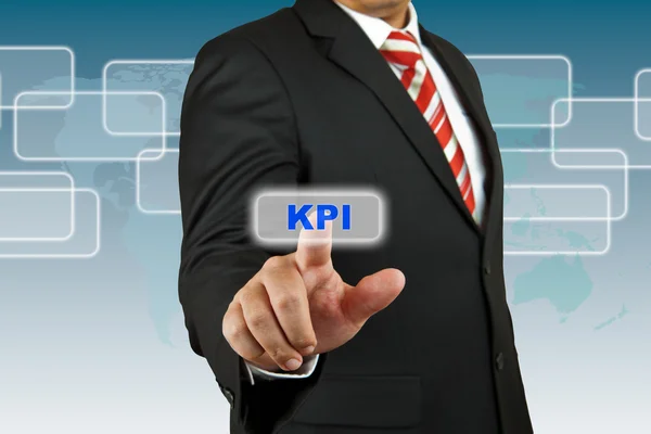 Homme d'affaires appuyer sur le bouton KPI — Photo