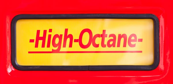 High Octane sign at classic fuel pump on red background — Stock Photo, Image