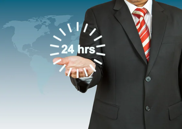 Businessman with 24 hour circle — Stock Photo, Image