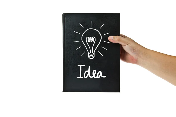 Black book with lightbulb idea — Stock Photo, Image