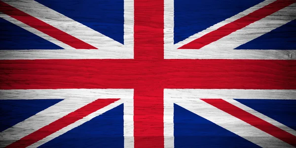Bandera del Reino Unido sobre textura madera — Foto de Stock