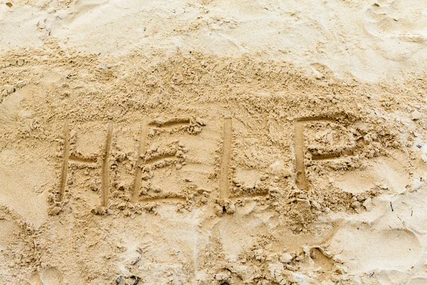 Help Sign on the beach — Stock Photo, Image